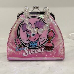Sesame Place Exclusive Abby Cadabby Kiss Lock Purse “Extra Sweet”